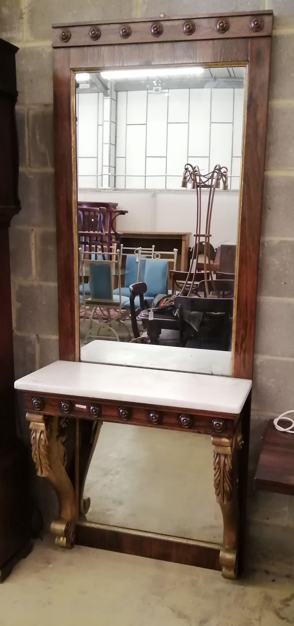 A George IV style marble topped parcel gilt rosewood console table with mirror back, W.80cm, D.33cm, H.210cm